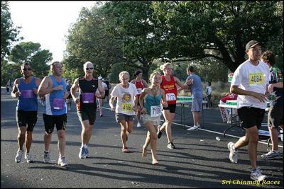 Alan (centre pic) running behind Emily (barefoot)